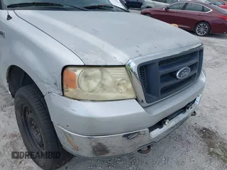 2004 Ford F-150 XL z VIN 1FTRF14504NA05239, wystawiony jako IAAI lot #41272950 z przebiegiem Nie podano mil oraz . Historia ofert i sprzedaży dostępna na DreamBid. Obrazek 16.