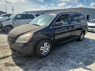 2006 Honda Odyssey EX-L with VIN 5FNRL38786B452998, listed as a Copart auction lot 61901335 with 276,914 mi miles and Salvage title. Bid and sale history available at DreamBid. Image 1.