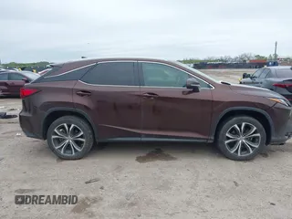 2016 Lexus RX 350 z VIN 2T2ZZMCA5GC029529, wystawiony jako IAAI lot #41953567 z przebiegiem 133 460 mil mil oraz . Historia ofert i sprzedaży dostępna na DreamBid. Obrazek 13.