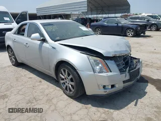 2009 Cadillac CTS RWD z VIN 1G6DV57V990149721, wystawiony jako IAAI lot #42293590 z przebiegiem 64 642 mil mil oraz . Historia ofert i sprzedaży dostępna na DreamBid. Obrazek 1.