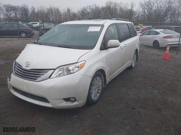 2015 Toyota Sienna XLE with VIN 5TDYK3DC8FS537028, listed as a IAAI auction lot 41192117 with 198,243 mi miles. Bid and sale history available at carsss.com. Image 2.