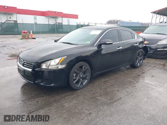 2014 Nissan Maxima SV with VIN 1N4AA5AP6EC437992, listed as a IAAI auction lot 41856233 with 69,059 mi miles and . Bid and sale history available at DreamBid. Image 19.