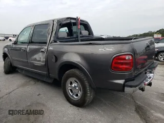 2002 Ford F-150 XLT with VIN 1FTRW08662KC45830, listed as a Copart auction lot 69485294 with 218,248 mi miles and Salvage Title. Bid and sale history available at carsss.com. Image 2.