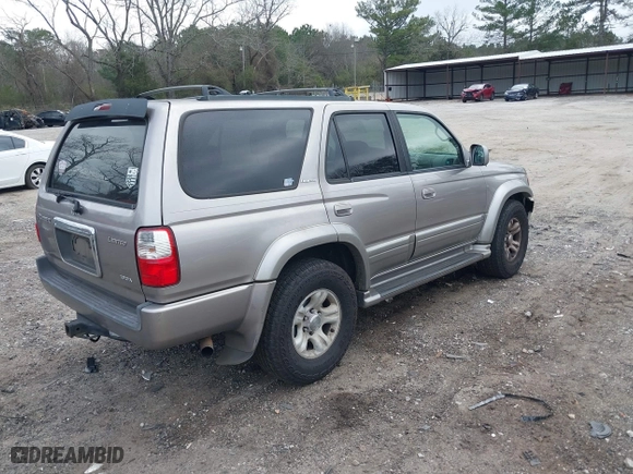2002 Toyota 4Runner Limited with VIN JT3GN87R520229610, listed as a IAAI auction lot 41806628 with 338,035 mi miles. Bid and sale history available at carsss.com. Image 4.