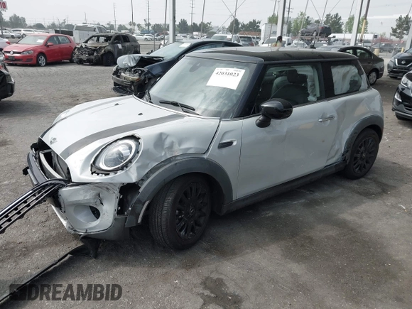 2021 MINI Hardtop Cooper with VIN WMWXR3C09M2N96671, listed as a IAAI auction lot 42031023 with 12,450 mi miles and . Bid and sale history available at DreamBid. Image 2.