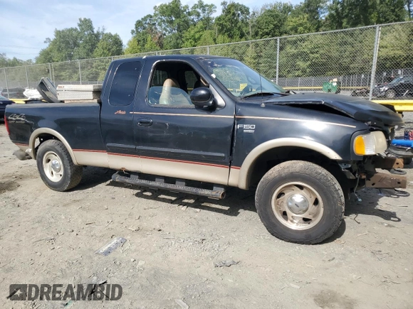 2000 Ford F-150 XL with VIN 1FTRX18L4YNB09146, listed as a Copart auction lot 69866804 with 0 mi miles and Non Repairable. Bid and sale history available at carsss.com. Image 4.