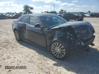 2011 Cadillac CTS Performance with VIN 1G6DJ5ED9B0164117, listed as a Copart auction lot 71833424 with 114,717 mi miles and Salvage Title. Bid and sale history available at DreamBid. Image 4.