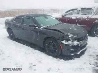 2015 Dodge Charger SXT with VIN 2C3CDXJG8FH746291, listed as a IAAI auction lot 41102488 with 189,971 mi miles. Bid and sale history available at carsss.com. Image 1.