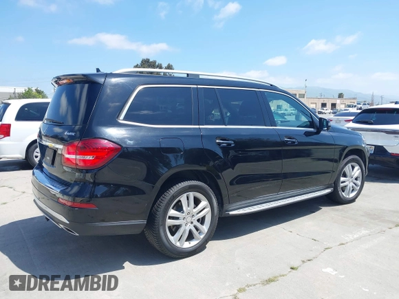 2017 Mercedes-Benz GLS 450 with VIN 4JGDF6EE9HA873951, listed as a IAAI auction lot 42053519 with 96,840 mi miles and . Bid and sale history available at DreamBid. Image 6.