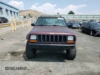 2000 Jeep Cherokee SE with VIN 1J4FF28S9YL133208, listed as a Copart auction lot 63827924 with 0 mi miles and Salvage Title. Bid and sale history available at carsss.com. Image 11.