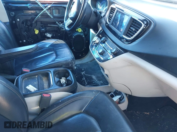2018 Chrysler Pacifica Touring L with VIN 2C4RC1BGXJR157184, listed as a IAAI auction lot 41803388 with 102,095 mi miles and . Bid and sale history available at DreamBid. Image 5.