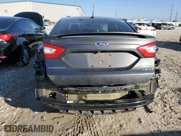 2016 Ford Fusion Titanium Hybrid with VIN 3FA6P0RU9GR289892, listed as a Copart auction lot 42735125 with 82,386 mi miles and Salvage Title. Bid and sale history available at carsss.com. Image 6.