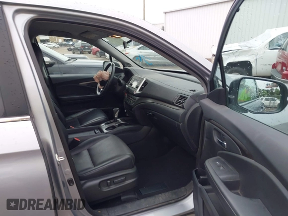 2018 Honda Ridgeline RTL with VIN 5FPYK3F52JB002649, listed as a IAAI auction lot 42338360 with 68,802 mi miles and . Bid and sale history available at DreamBid. Image 5.