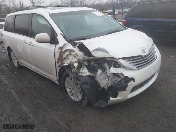2015 Toyota Sienna XLE with VIN 5TDYK3DC8FS537028, listed as a IAAI auction lot 41192117 with 198,243 mi miles. Bid and sale history available at carsss.com. Image 6.