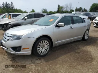2010 Ford Fusion Hybrid с VIN 3FADP0L36AR113736, выставлен на аукционе Copart как лот 62707285 с пробегом 276 207 миль миль и На запчасти • Non repairable. История ставок и продаж доступна на DreamBid. Изображение 1.
