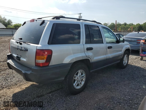 2004 Jeep Grand Cherokee Laredo with VIN 1J4GW48S44C282992, listed as a Copart auction lot 61523685 with 112,486 mi miles and Clean title. Bid and sale history available at DreamBid. Image 3.