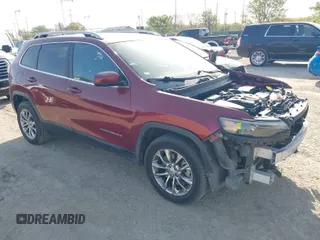 2019 Jeep Cherokee Altitude with VIN 1C4PJLLXXKD120325, listed as a IAAI auction lot 41838643 with 124,315 mi miles. Bid and sale history available at carsss.com. Image 1.