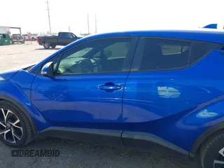 2018 Toyota C-HR XLE z VIN NMTKHMBX7JR004448, wystawiony jako IAAI lot #42785933 z przebiegiem 112 115 mil mil oraz . Historia ofert i sprzedaży dostępna na DreamBid. Obrazek 14.