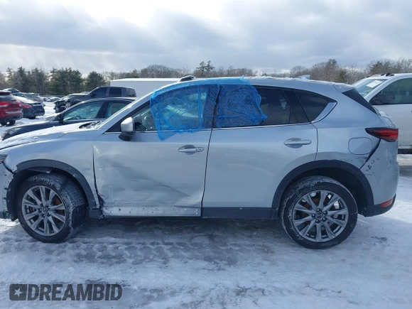 2021 Mazda CX-5 Grand Touring Reserve with VIN JM3KFBAY0M0377030, listed as a IAAI auction lot 41606709 with 39,590 mi miles. Bid and sale history available at carsss.com. Image 14.