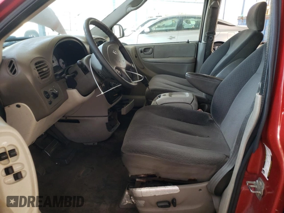 2005 Dodge Caravan SXT with VIN 2D4GP44L65R120861, listed as a Copart auction lot 57040565 with 244,971 mi miles and Salvage title. Bid and sale history available at DreamBid. Image 7.