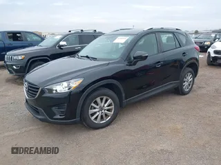 2016 Mazda CX-5 Sport with VIN JM3KE2BY4G0761933, listed as a IAAI auction lot 41709274 with 131,127 mi miles. Bid and sale history available at carsss.com. Image 18.