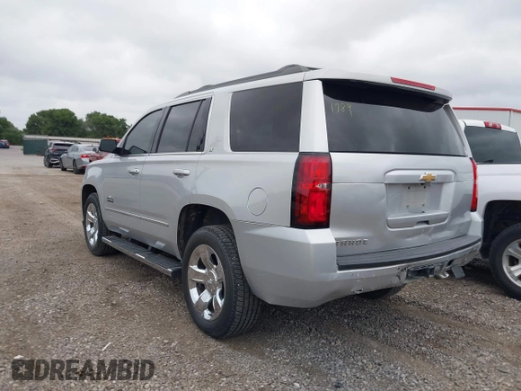 2019 Chevrolet Tahoe LT z VIN 1GNSCBKC1KR191789, wystawiony jako IAAI lot #42144961 z przebiegiem 94 178 mil mil oraz . Historia ofert i sprzedaży dostępna na DreamBid. Obrazek 3.