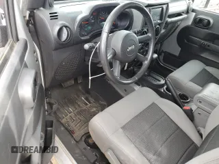 2009 Jeep Wrangler X with VIN 1J4FA24199L787574, listed as a Copart auction lot 58189835 with 74,331 mi miles and Salvage title. Bid and sale history available at DreamBid. Image 8.