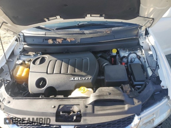 2012 Dodge Journey SXT z VIN 3C4PDDBG1CT217441, wystawiony jako Copart lot #43275685 z przebiegiem 151 651 mil mil oraz Szkoda całkowita • Salvage title. Historia ofert i sprzedaży dostępna na DreamBid. Obrazek 12.