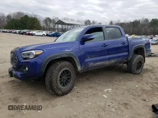 2023 Toyota Tacoma SR z VIN 3TYCZ5AN1PT122890, wystawiony jako Copart lot #42321665 z przebiegiem 28 399 mil mil oraz Szkoda całkowita • Salvage title. Historia ofert i sprzedaży dostępna na DreamBid. Obrazek 1.