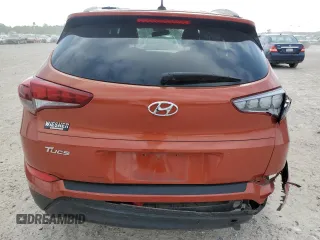 2017 Hyundai Tucson SE z VIN KM8J33A42HU486275, wystawiony jako Copart lot #53658145 z przebiegiem 31 928 mil mil oraz Szkoda całkowita • Salvage title. Historia ofert i sprzedaży dostępna na DreamBid. Obrazek 6.
