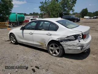 2013 BMW 3 Series 328i with VIN WBA3A5G58DNP21035, listed as a Copart auction lot 60543305 with 151,768 mi miles and Salvage title. Bid and sale history available at DreamBid. Image 2.