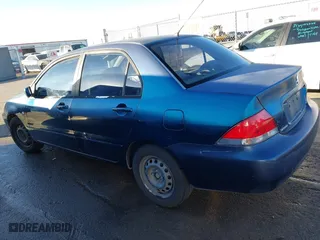 2005 Mitsubishi Lancer ES with VIN JA3AJ26E65U014838, listed as a IAAI auction lot 41310586 with 127,487 mi miles. Bid and sale history available at carsss.com. Image 14.