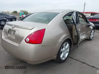 2004 Nissan Maxima SE with VIN 1N4BA41EX4C927086, listed as a IAAI auction lot 41734539 with 135,331 mi miles and . Bid and sale history available at DreamBid. Image 4.