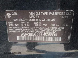 2014 BMW 3 Series 328i xDrive with VIN WBA3B5G56ENS06890, listed as a IAAI auction lot 42168982 with 133,664 mi miles. Bid and sale history available at carsss.com. Image 9.