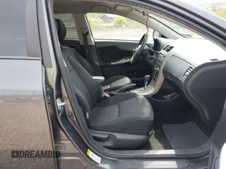 2010 Toyota Corolla with VIN 2T1BU4EE6AC452311, listed as a IAAI auction lot 42148627 with 217,921 mi miles. Bid and sale history available at carsss.com. Image 5.