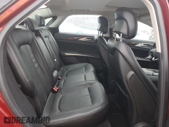2016 Lincoln MKZ z VIN 3LN6L2J95GR605230, wystawiony jako Copart lot #57844905 z przebiegiem 95 530 mil mil oraz Czysty tytuł • Clean title. Historia ofert i sprzedaży dostępna na DreamBid. Obrazek 10.