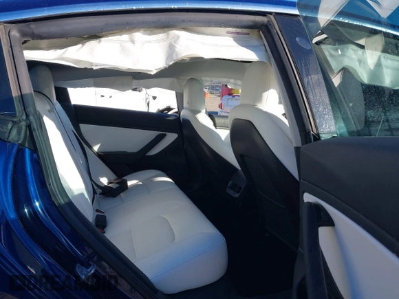 2019 Tesla Model 3 Long Range with VIN 5YJ3E1EB7KF454636, listed as a IAAI auction lot 41853972 with 56,916 mi miles. Bid and sale history available at carsss.com. Image 8.