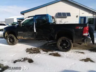 2013 GMC Sierra 1500 SLT with VIN 3GTP2WE76DG301097, listed as a Copart auction lot 42547415 with 240,595 mi miles and Salvage Title. Bid and sale history available at carsss.com. Image 2.