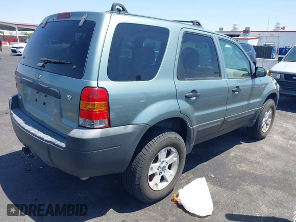 2005 Ford Escape XLT with VIN 1FMYU93175KC21568, listed as a IAAI auction lot 42581547 with 134,721 mi miles and . Bid and sale history available at DreamBid. Image 4.