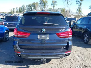 2014 BMW X5 xDrive35d with VIN 5UXKS4C52E0J96532, listed as a IAAI auction lot 41763066 with 153,634 mi miles. Bid and sale history available at carsss.com. Image 16.