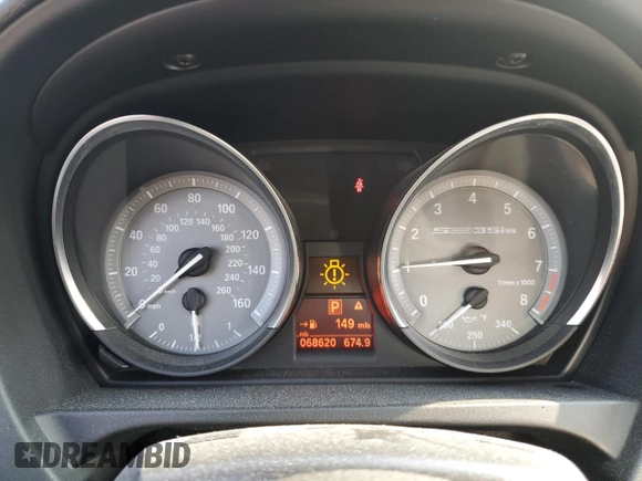 2014 BMW Z4 sDrive35is with VIN WBALM1C57EE634167, listed as a Copart auction lot 69088044 with 68,620 mi miles and Salvage title. Bid and sale history available at DreamBid. Image 9.