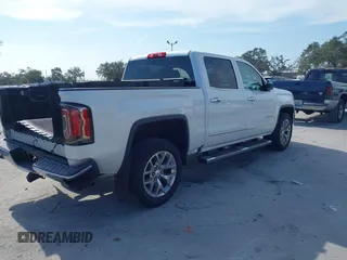 2017 GMC Sierra 1500 SLT with VIN 3GTP1NECXHG423591, listed as a IAAI auction lot 41509177 with 100,071 mi miles and . Bid and sale history available at DreamBid. Image 4.