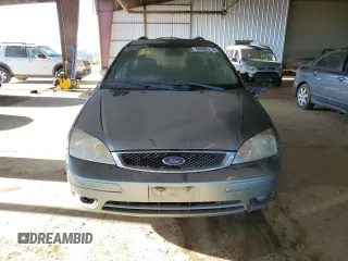 2005 Ford Focus SE with VIN 1FAHP36N85W239888, listed as a Copart auction lot 50426775 with 302,828 mi miles and Clean Title. Bid and sale history available at carsss.com. Image 5.