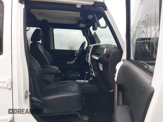2017 Jeep Wrangler Unlimited Sahara with VIN 1C4BJWEG4HL752776, listed as a IAAI auction lot 41834737 with 110,791 mi miles. Bid and sale history available at carsss.com. Image 5.