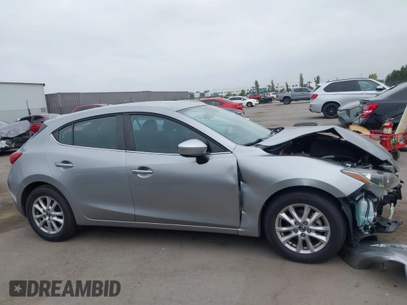 2014 Mazda 3 i Touring with VIN JM1BM1L76E1204265, listed as a IAAI auction lot 42565471 with 68,675 mi miles and . Bid and sale history available at DreamBid. Image 13.