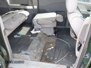2004 Nissan Quest S with VIN 5N1BV28U44N363273, listed as a IAAI auction lot 40471920 with 192,009 mi miles. Bid and sale history available at carsss.com. Image 8.