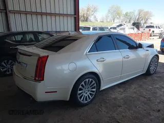 2013 Cadillac CTS Premium z VIN 1G6DS5E30D0105240, wystawiony jako IAAI lot #42145007 z przebiegiem 100 893 mil mil oraz . Historia ofert i sprzedaży dostępna na DreamBid. Obrazek 4.