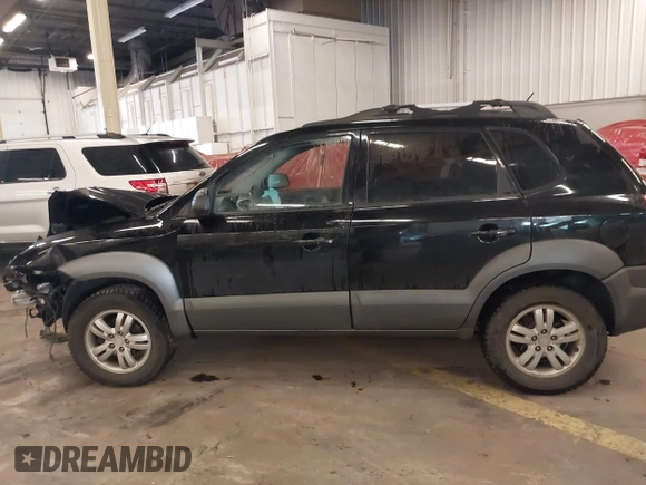 2007 Hyundai Tucson SE with VIN KM8JN72D47U670938, listed as a IAAI auction lot 41620857 with 129,769 mi miles and . Bid and sale history available at DreamBid. Image 15.