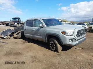 2018 Toyota Tacoma SR5 z VIN 3TMDZ5BN6JM050557, wystawiony jako IAAI lot #41146350 z przebiegiem 88 798 mil mil oraz . Historia ofert i sprzedaży dostępna na DreamBid. Obrazek 1.