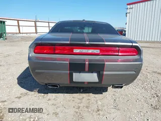 2011 Dodge Challenger z VIN 2B3CJ4DG3BH512974, wystawiony jako IAAI lot #41431931 z przebiegiem 186 845 mil mil oraz . Historia ofert i sprzedaży dostępna na DreamBid. Obrazek 16.